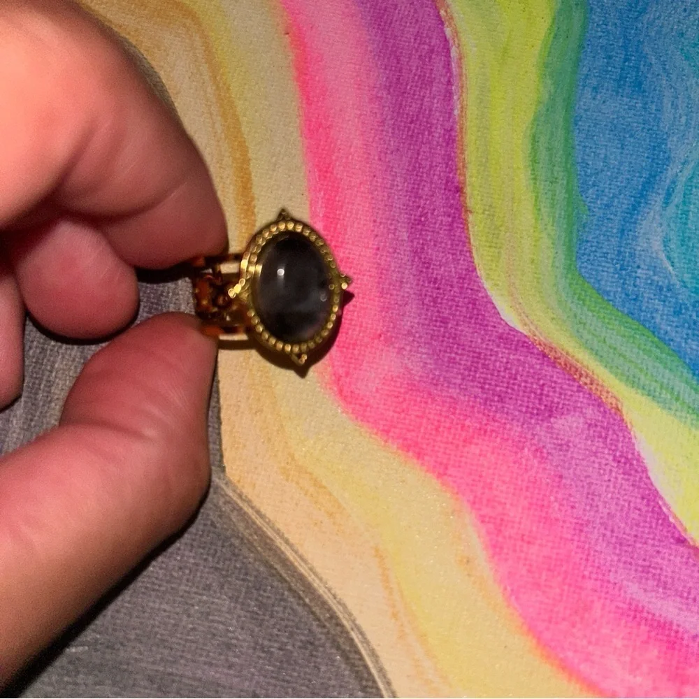 Elegant Gold and Black Ring